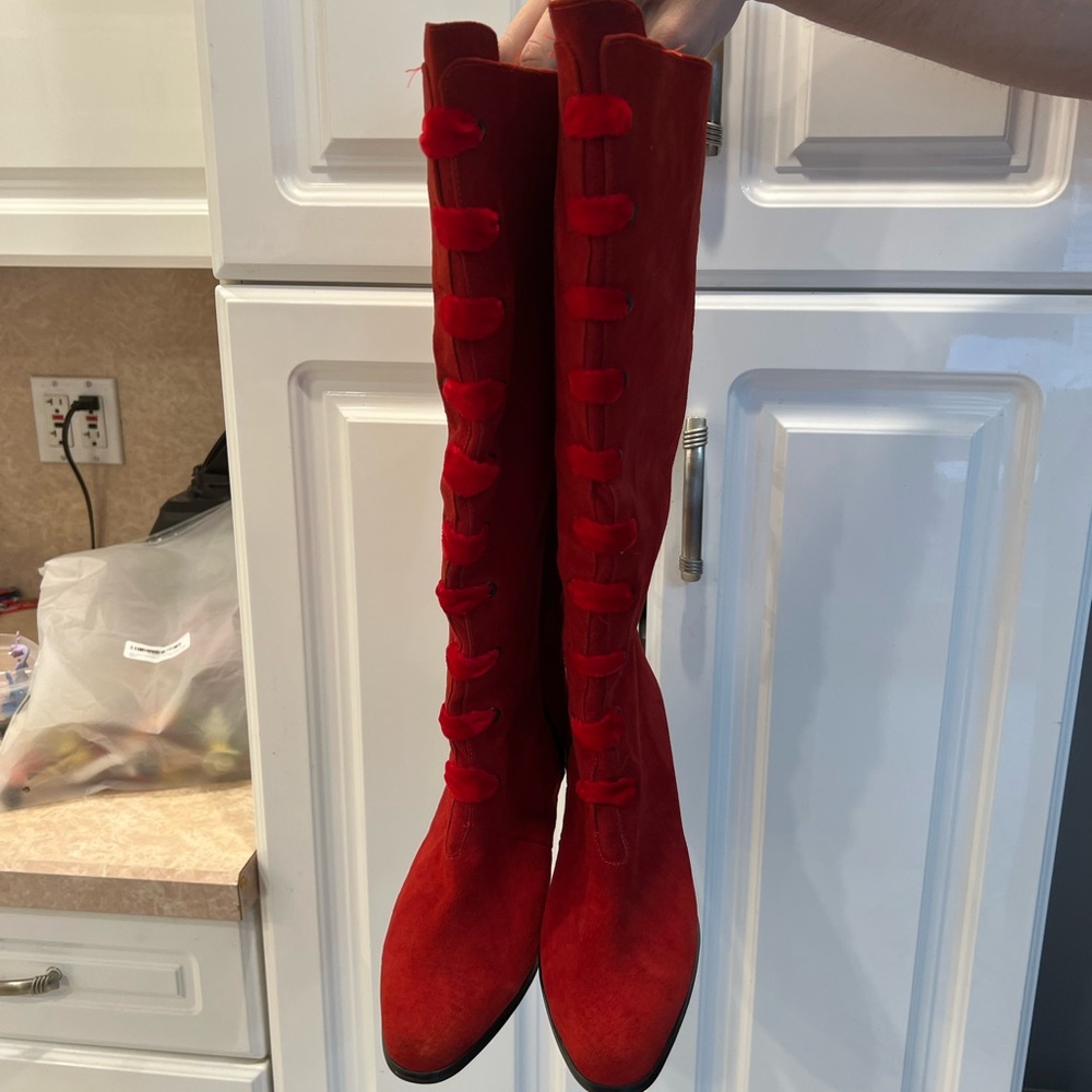 8 1/2. Red suede zipper boots new never worn